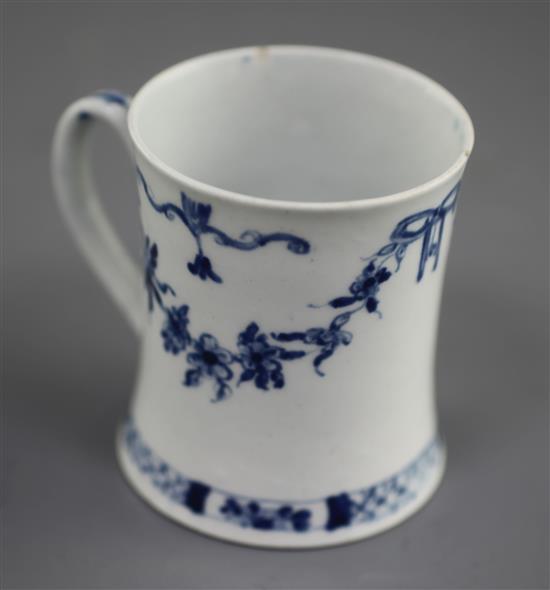 A very rare Worcester blue and white Floral Swag, Ribbon and Scroll pattern coffee can, c.1755, two rim chips with short hairline crack